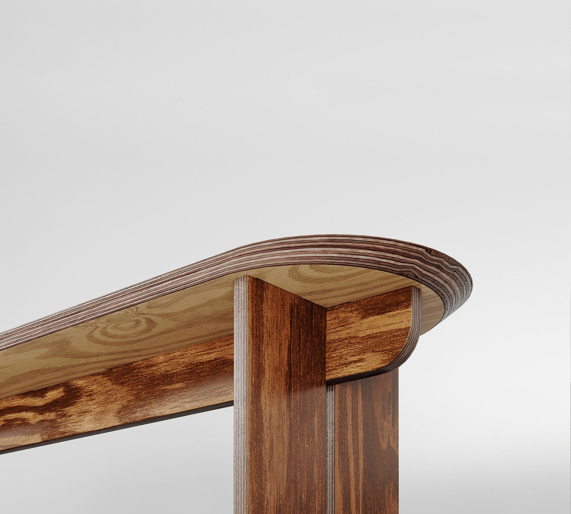 Curved wooden bench underside with a smooth finish, showcasing the natural beauty of the wood grain